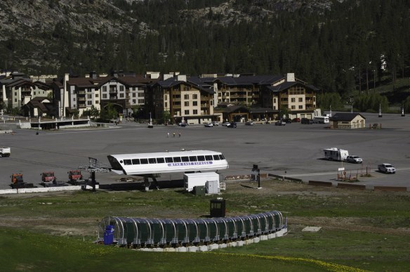 Ski Lifts and slope grooming equipment sit idle for the summer tourist season.