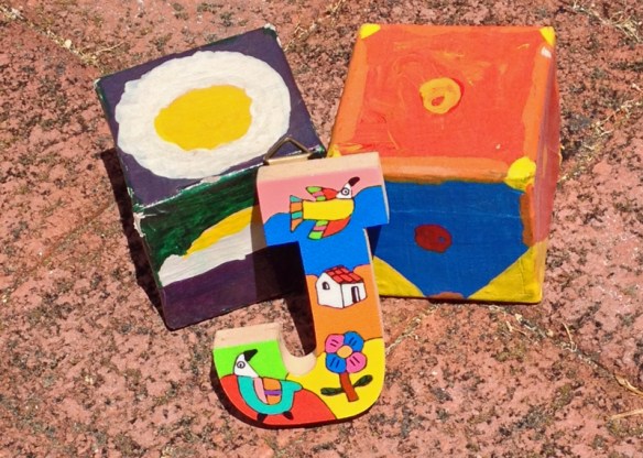 Mystery: The Letter J and Two Painted Boxes